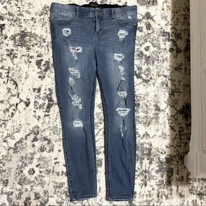 Torrid bombshell skinny jean premium stretch medium wash distressed ripped jeans